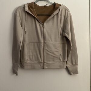 Beige Zip-Up Hoodie with Brown Lining